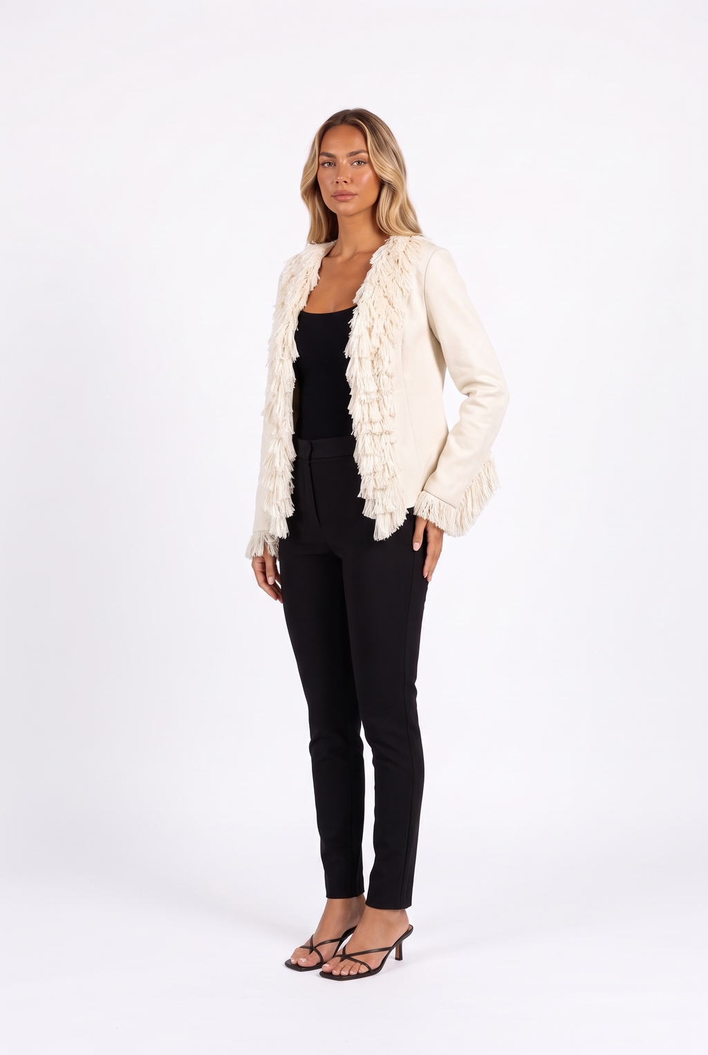 Cream open-front fringe-trim cropped jacket — three-quarter