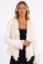 Cream open-front fringe-trim cropped jacket — fringe front edge and cuff detail