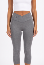 Heather grey crossover high-waist capri leggings — crossover waistband detail