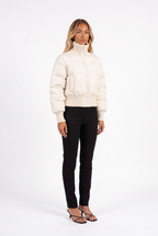 Ivory cropped puffer jacket with ribbed funnel collar — three-quarter