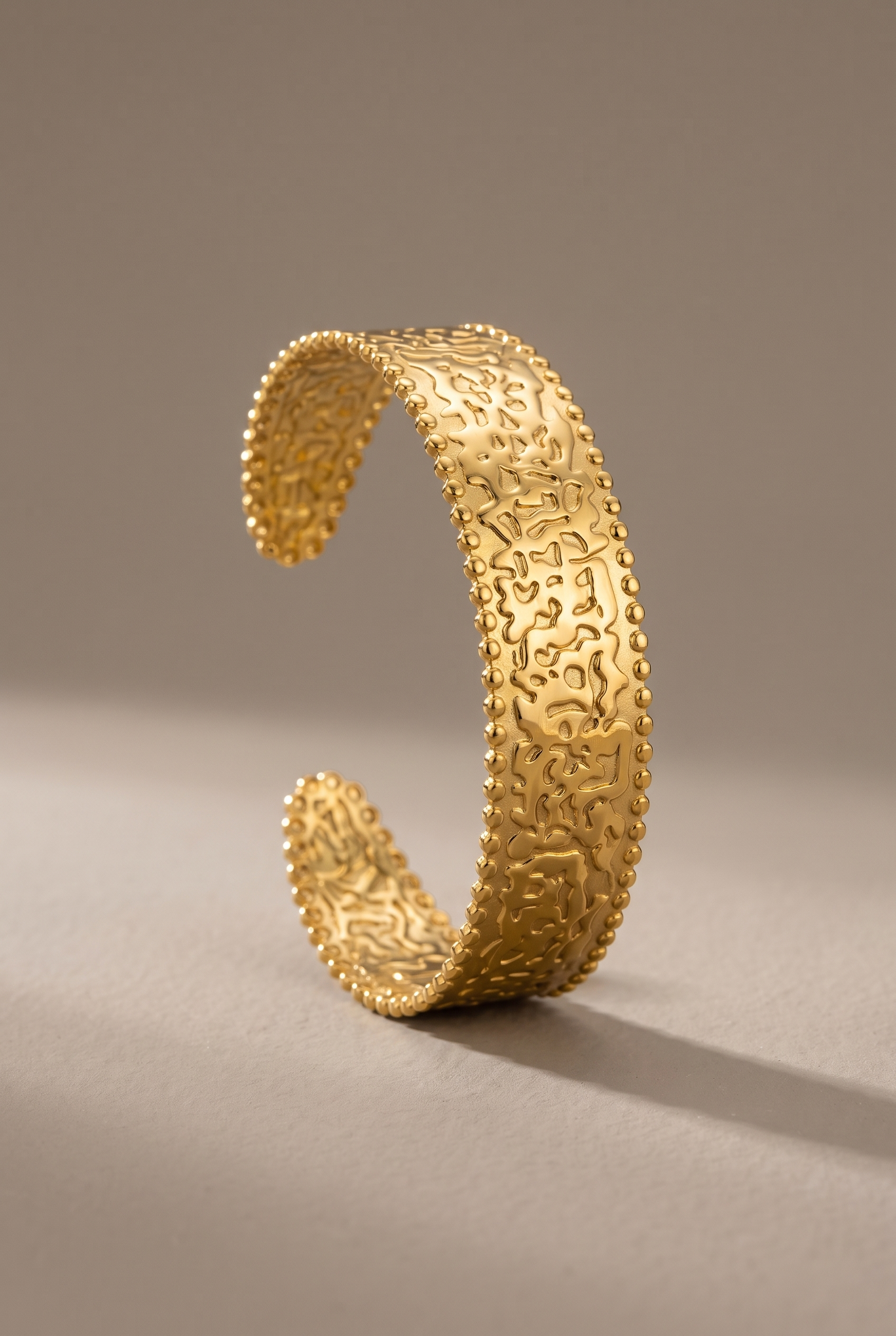 DropIQ hammered open cuff bangle with beaded edges in gold