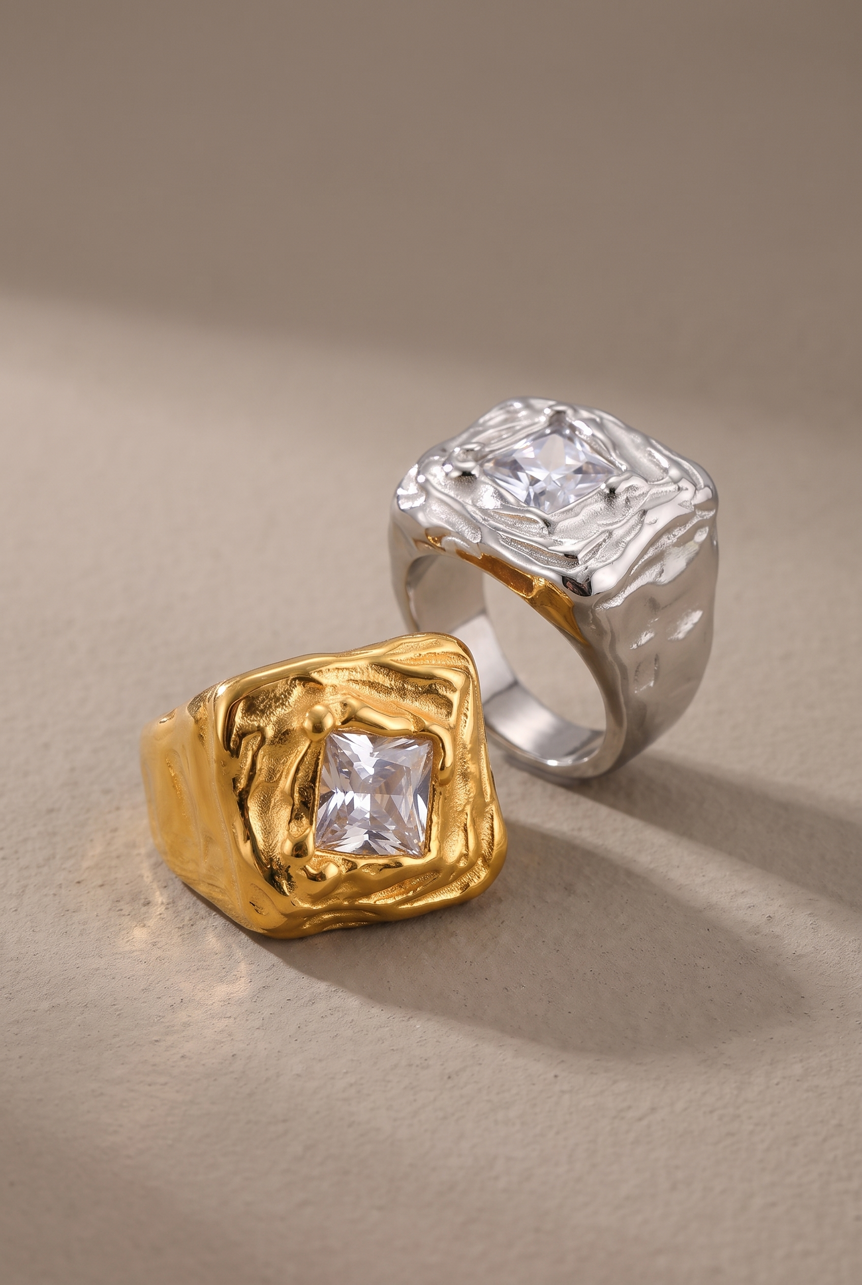 DropIQ molten square signet ring with clear stone in gold and silver