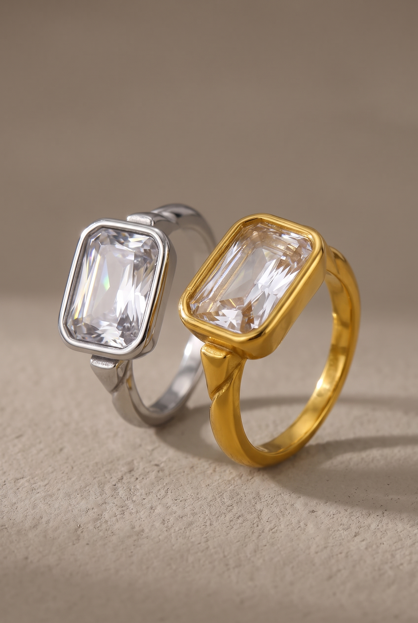 DropIQ emerald-cut crystal bezel ring in gold and silver