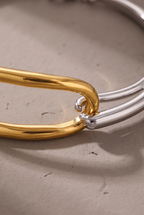 Close-up of the gold link and silver band connection