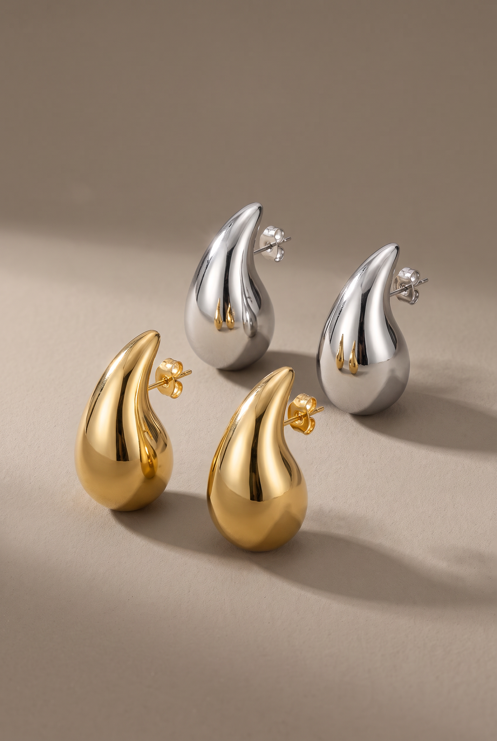 DropIQ chunky teardrop drop studs in gold and silver