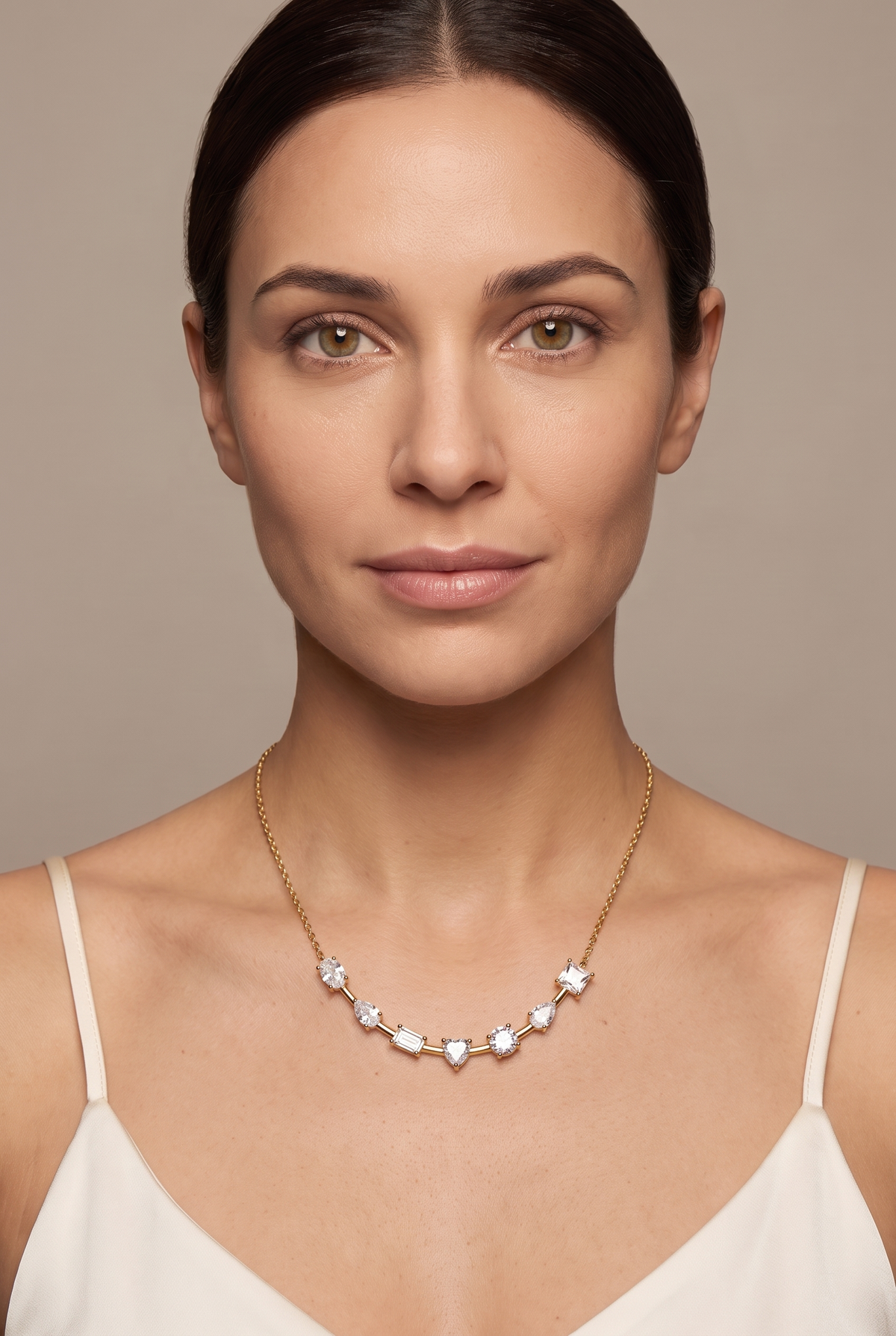 Seven-stone mixed-cut bar necklace worn at the collarbone