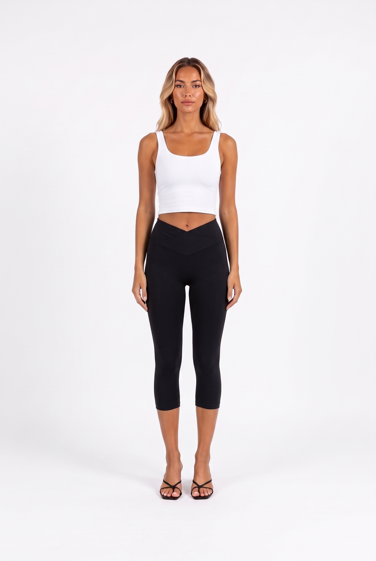 Crossover High-Waist Capri Leggings in black — front